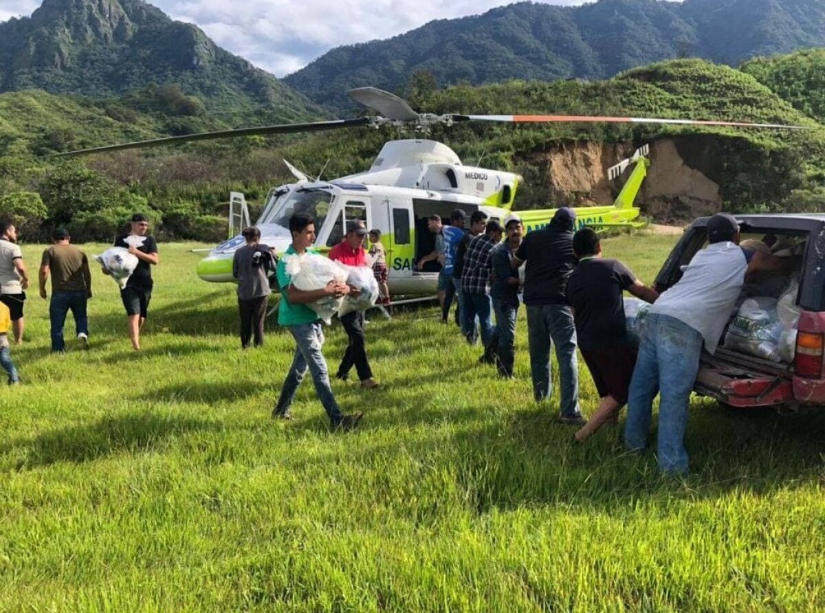 Provisions Delivered by Air to Rural Community Isolated for 13 Days After Storm